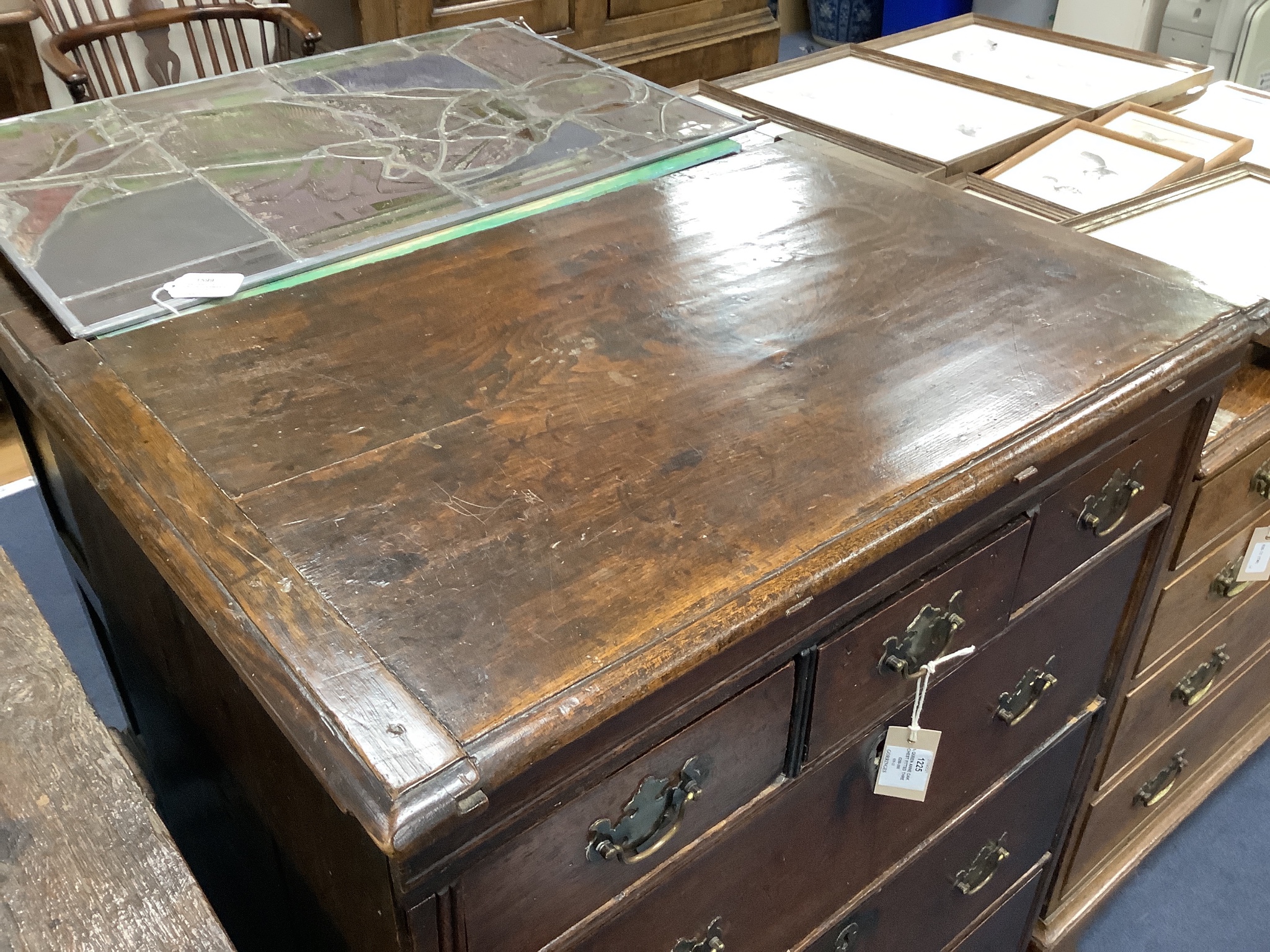 A Queen Anne oak chest fitted three short drawers and three long drawers, width 76cm, depth 49cm, height 98cm